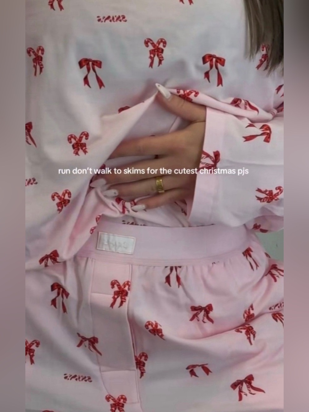SKIMS Pink Candy Cane Bow Holiday Pajama Set